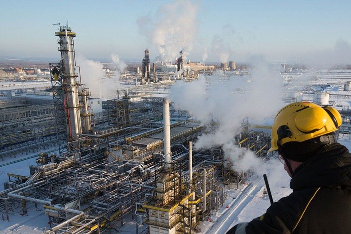 A worker overlooks the low-temperature isomerization unit at the Novokuibyshevsk oil refinery plant, operated by Rosneft PJSC, in Novokuibyshevsk, Samara region, Russia.