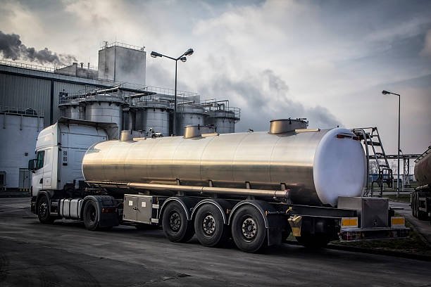 Chemical plant building with steel silos and tanker truck, Wroclaw, Poland